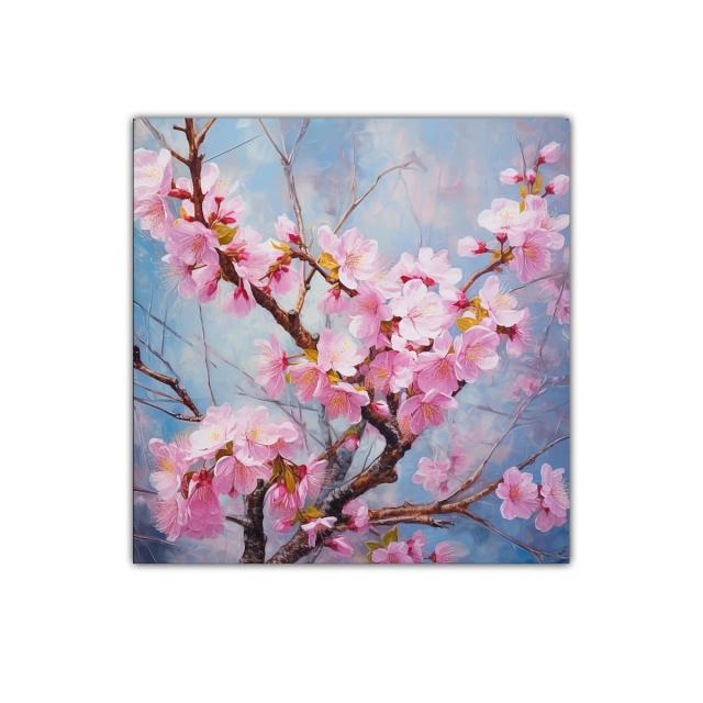 Rama florida de flores rosadas en cielo azul claro