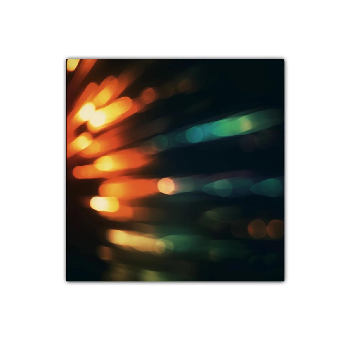 Cuadro moderno con luces abstractas en tonos cálidos y fríos