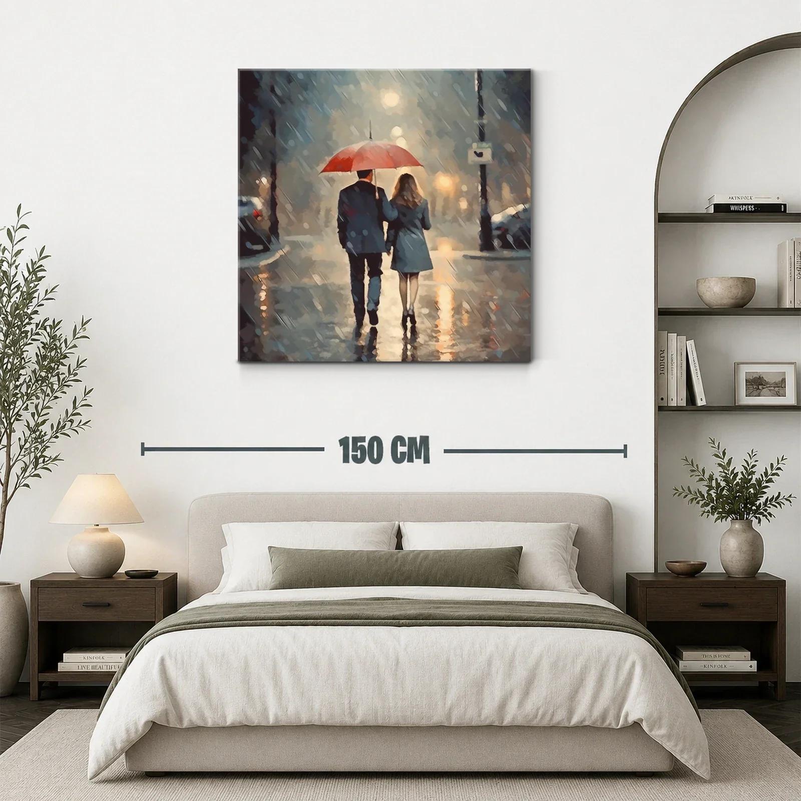 Pareja caminando bajo la lluvia con paraguas rojo — miniatura 3