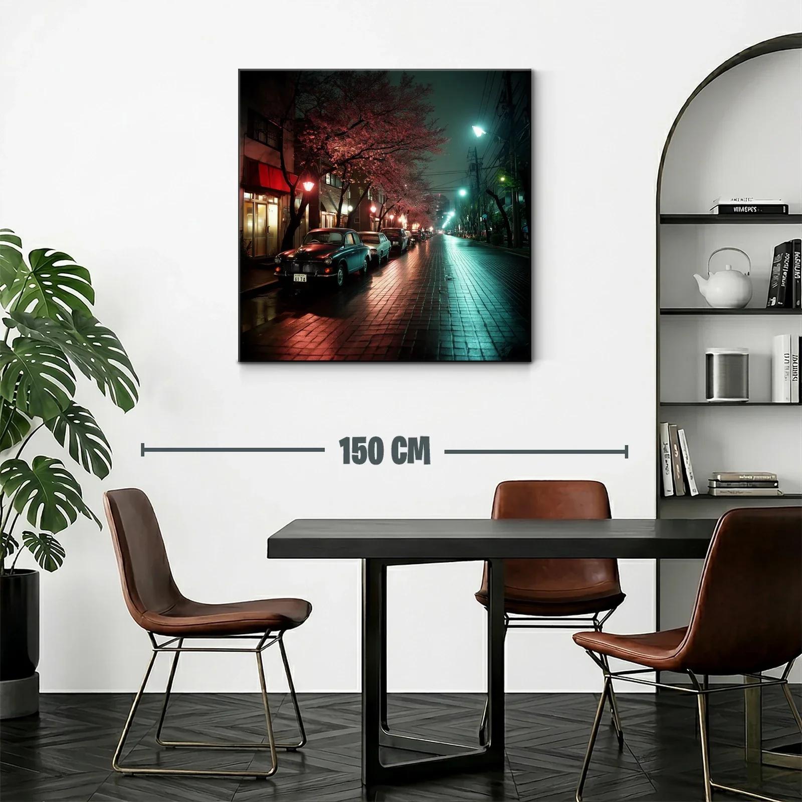 Calle nocturna con árboles rosados y coches clásicos — miniatura 2
