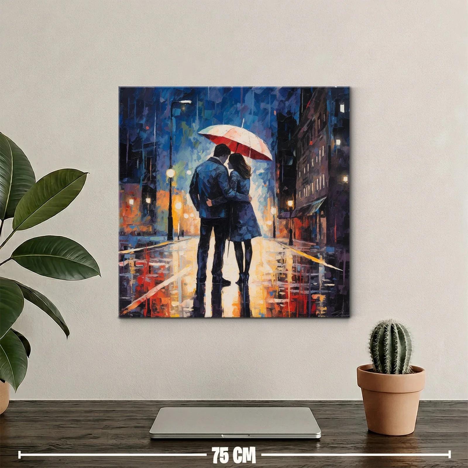 Pareja abrazada bajo paraguas en calle iluminada por la noche — miniatura 2