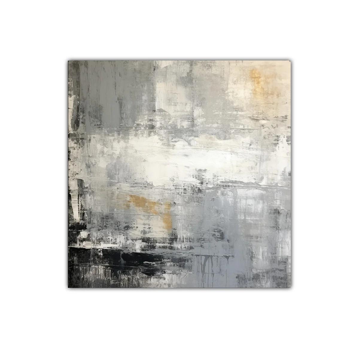 Cuadro abstracto en tonos grises con detalles dorados sutiles
