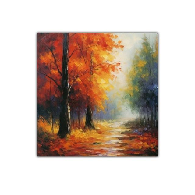 Camino entre árboles con hojas otoñales en tonos cálidos