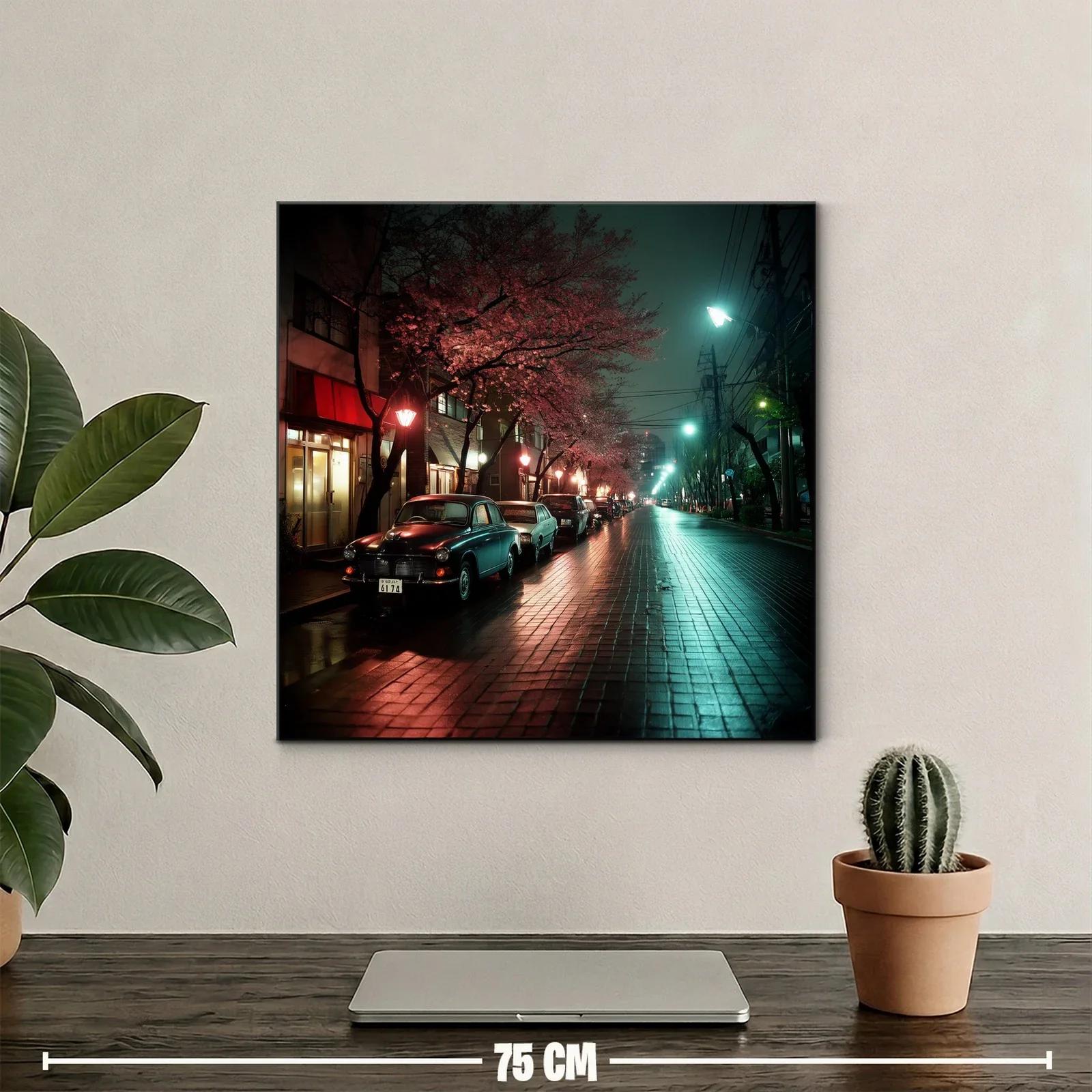 Calle nocturna con árboles rosados y coches clásicos — miniatura 2
