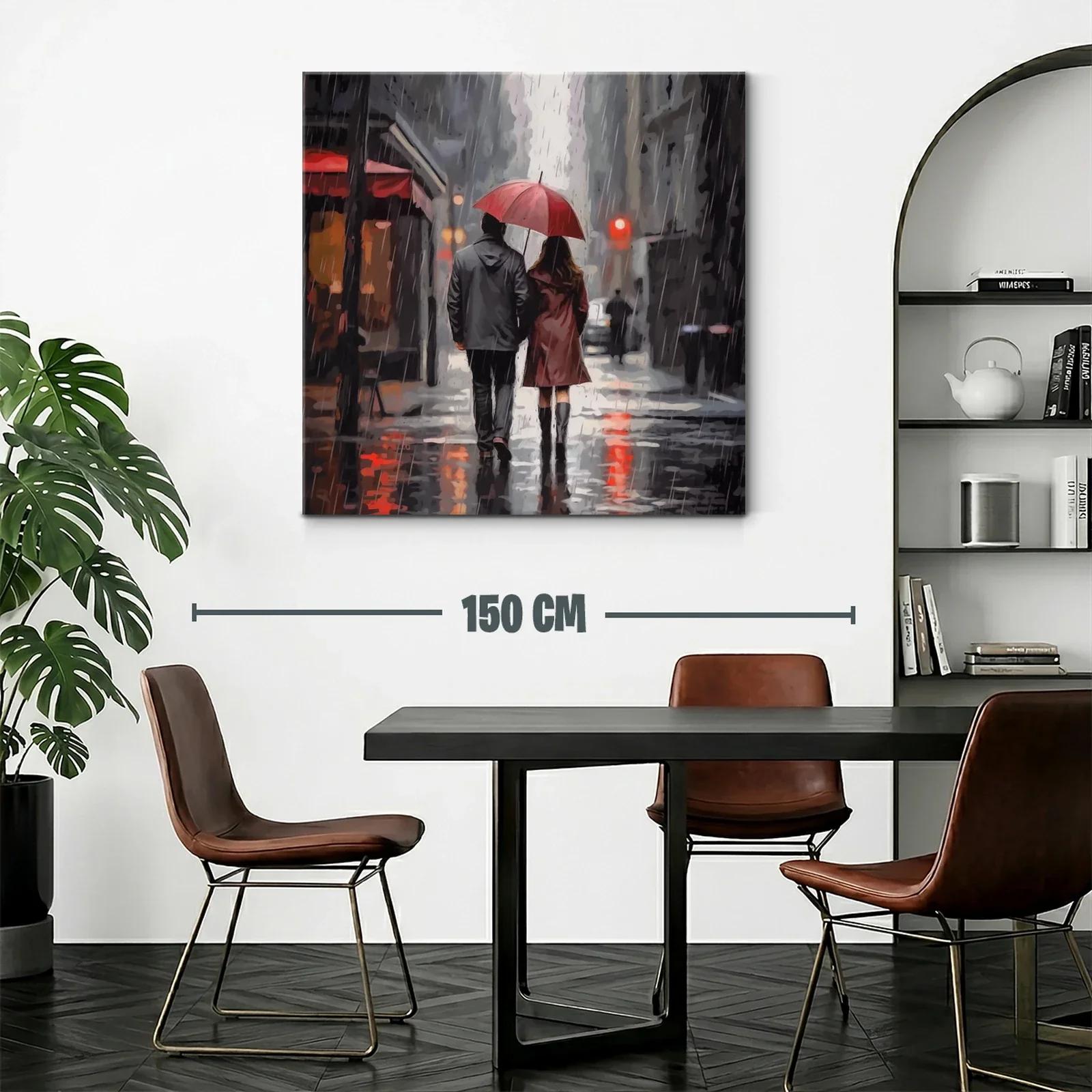 Pareja caminando bajo la lluvia con paraguas rojo — miniatura 2