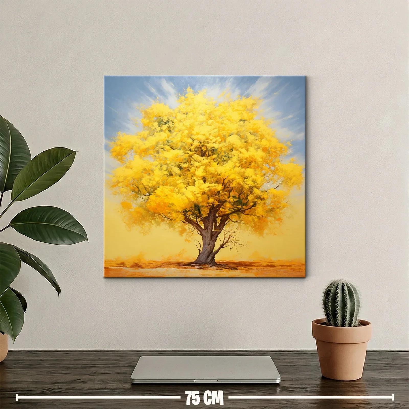Árbol con follaje dorado bajo cielo suave azul — miniatura 2