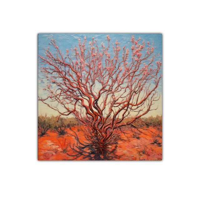 Árbol florido en paisaje desértico al atardecer