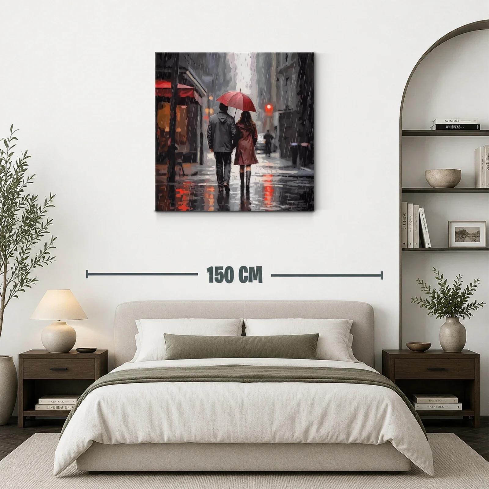 Pareja caminando bajo la lluvia con paraguas rojo — miniatura 3
