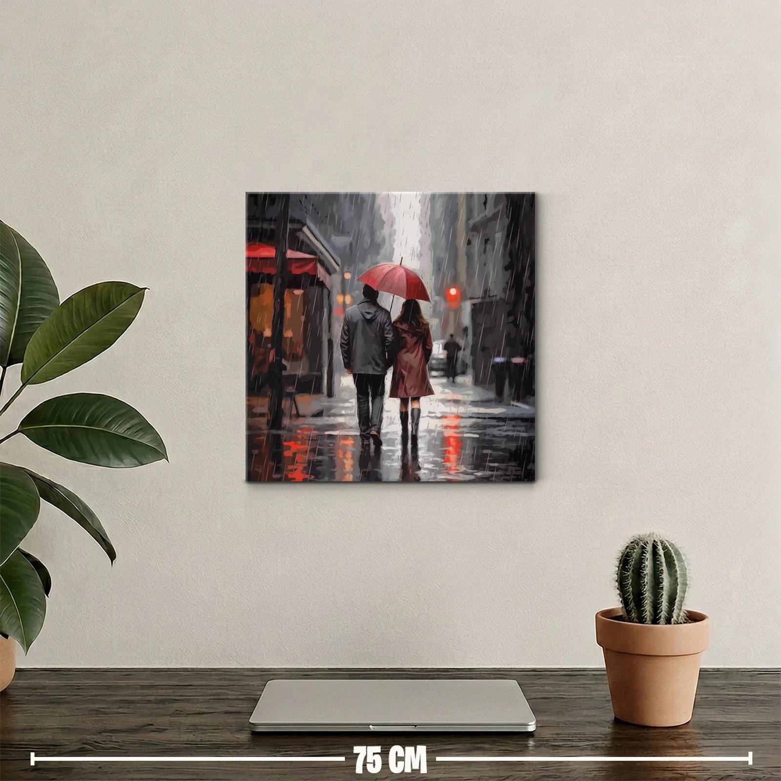 Pareja caminando bajo la lluvia con paraguas rojo — miniatura 2
