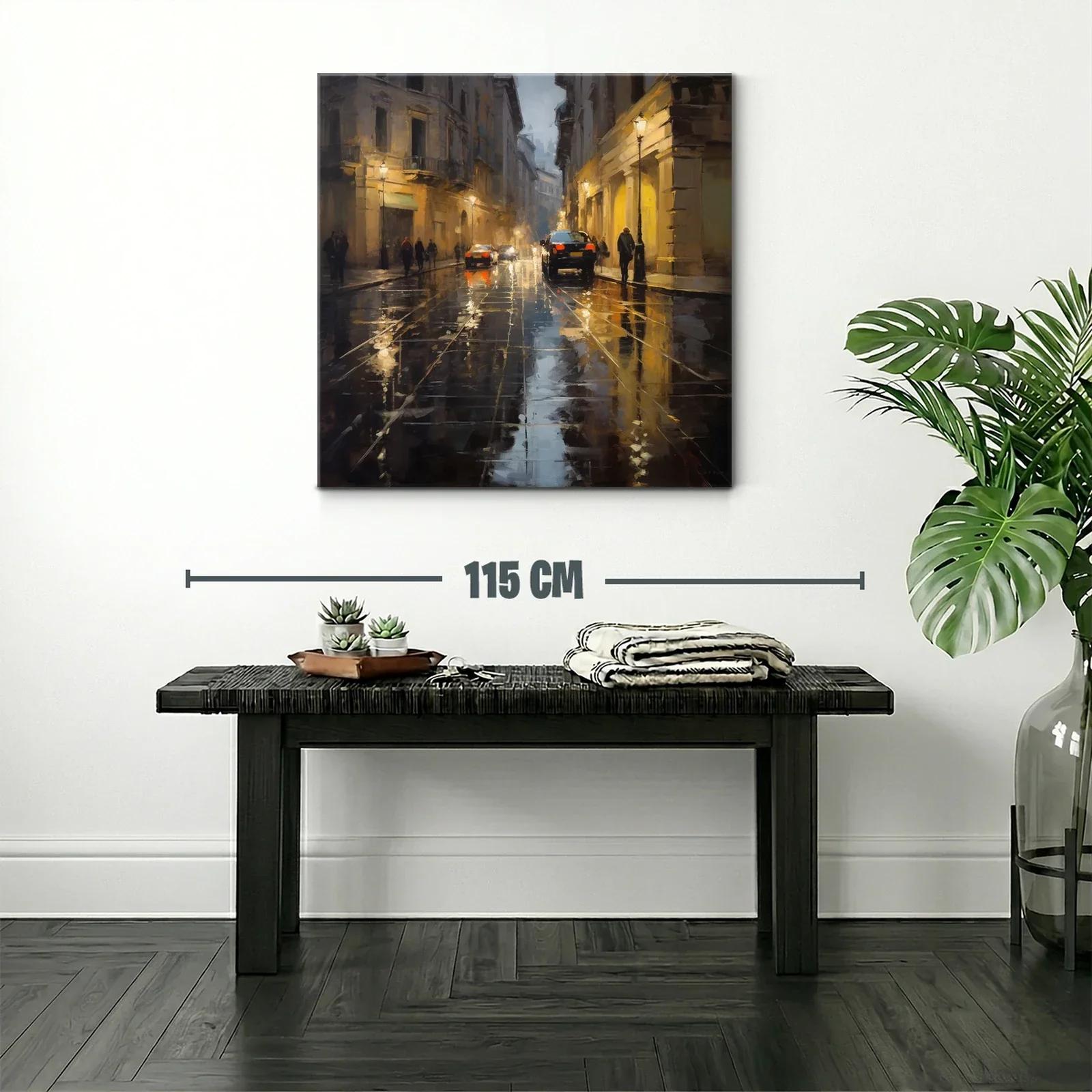 Calle urbana iluminada con reflejos en pavimento mojado — miniatura 2