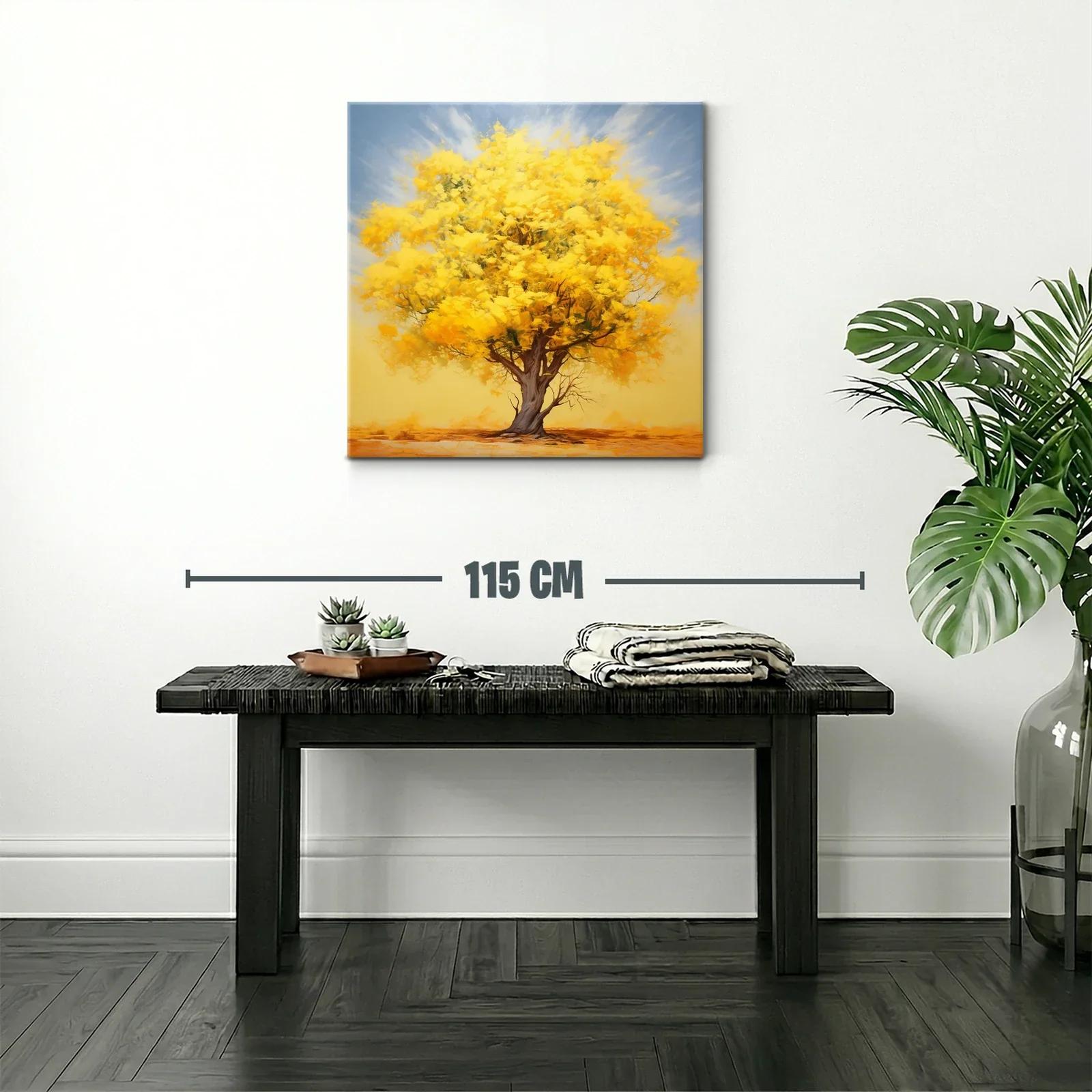 Árbol con follaje dorado bajo cielo suave azul — miniatura 2