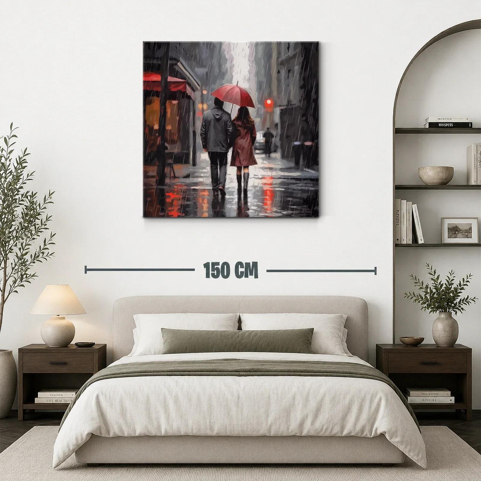 Pareja caminando bajo la lluvia con paraguas rojo — miniatura 3