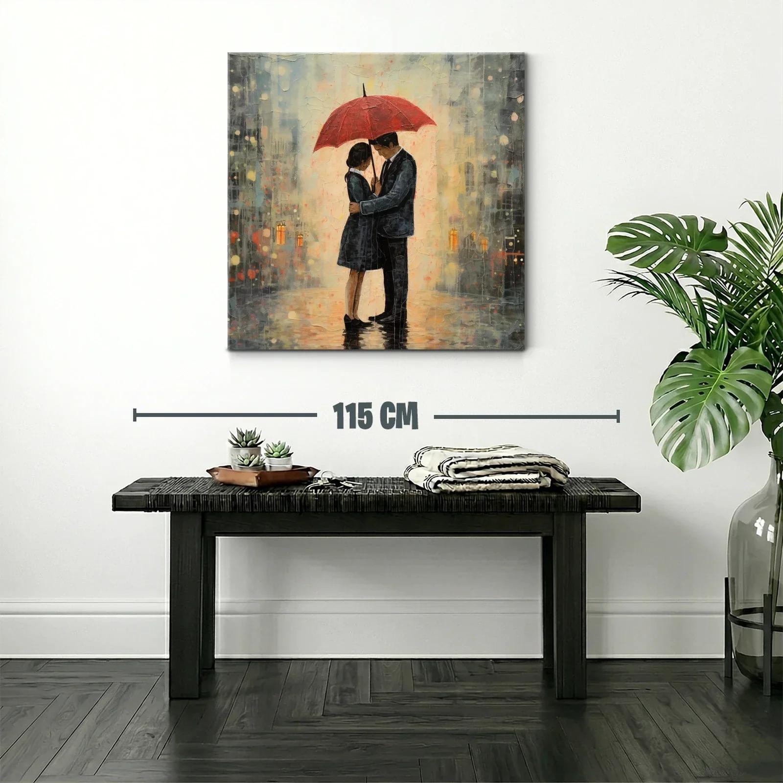 Romántico abrazo bajo un paraguas rojo en la lluvia — miniatura 2
