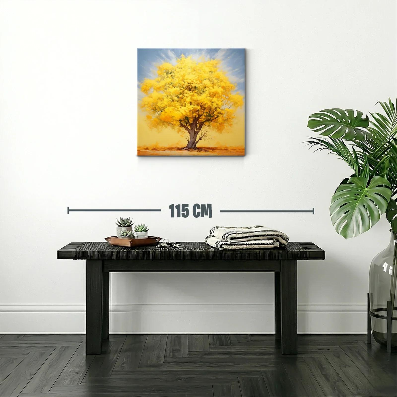 Árbol con follaje dorado bajo cielo suave azul — miniatura 2